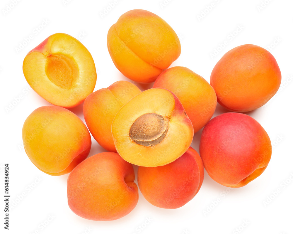 Heap of ripe apricots isolated on white background