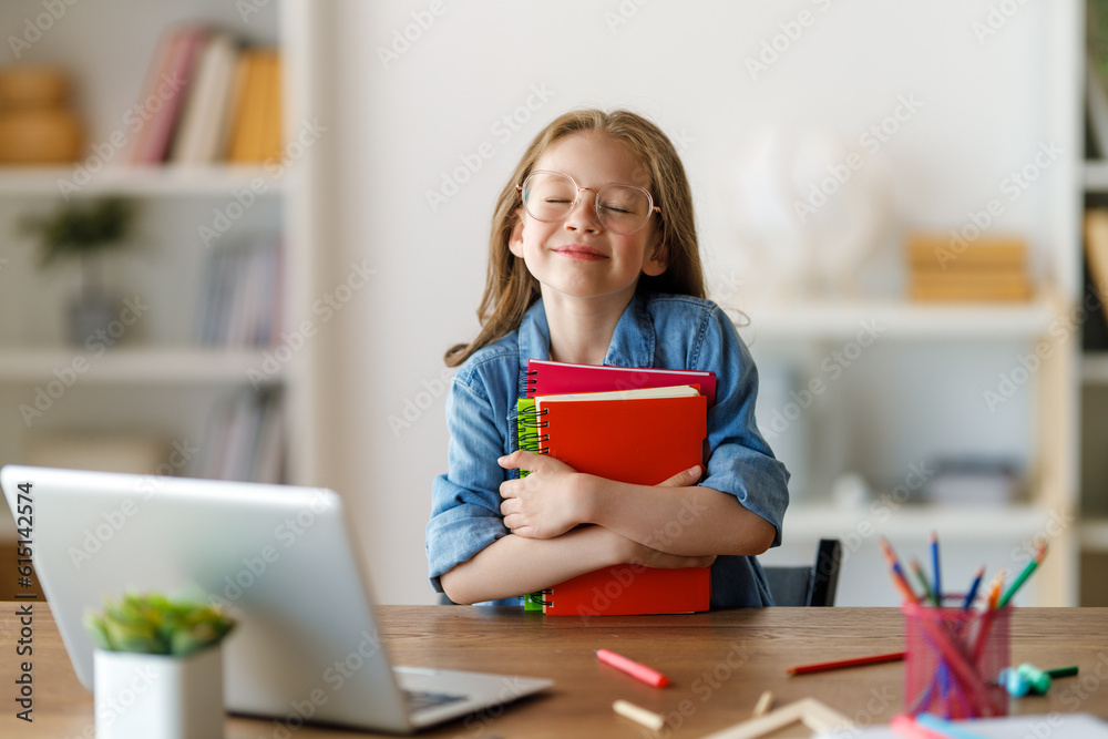 Girl doing homework or online education.