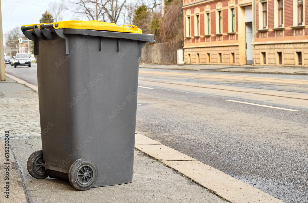 Garbage container on city street