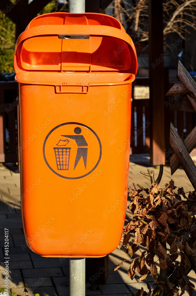 View of trash bin in city