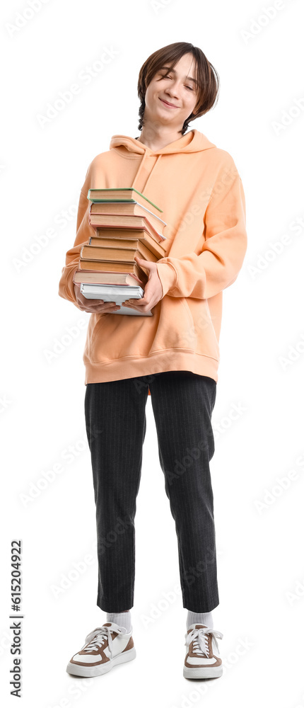 Teenage boy with books on white background