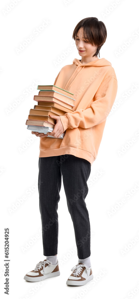 Teenage boy with books on white background