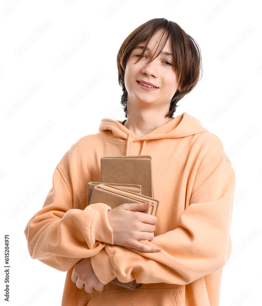 Teenage boy with books on white background