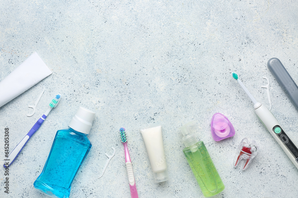 Supplies for oral hygiene on white background