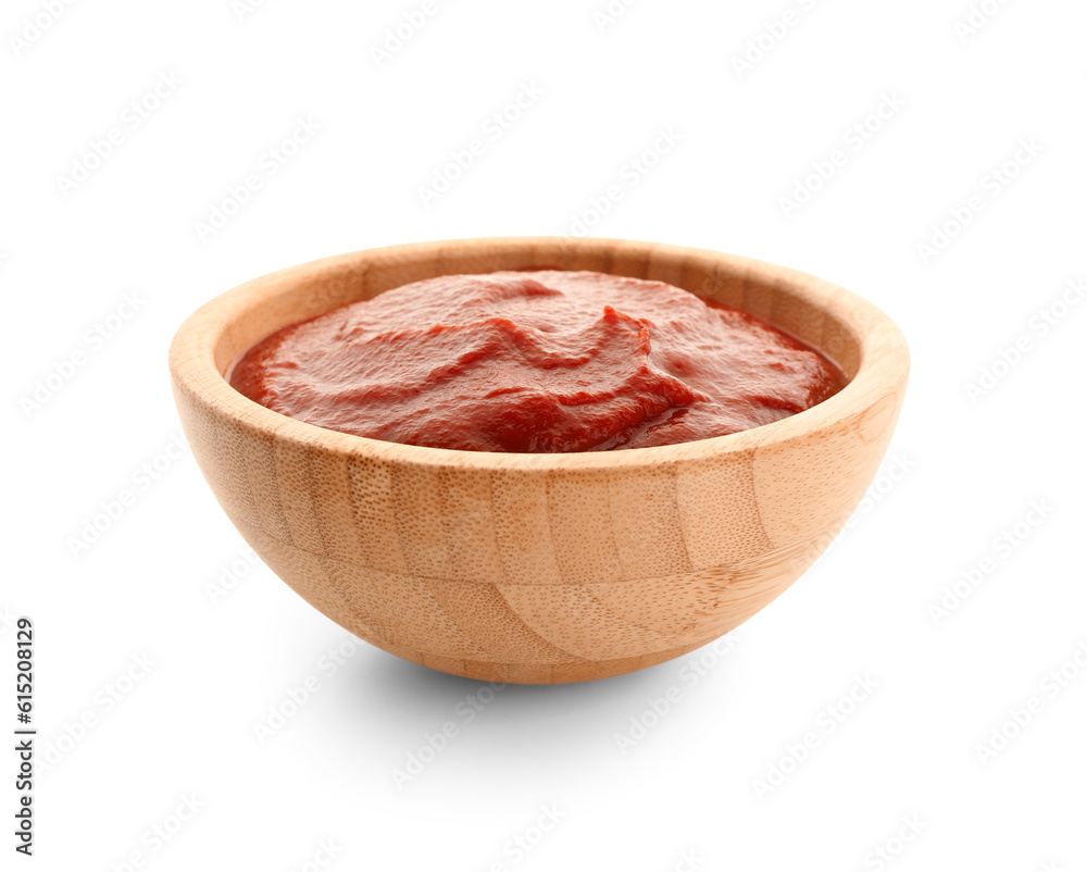 Bowl with tasty tomato paste on white background