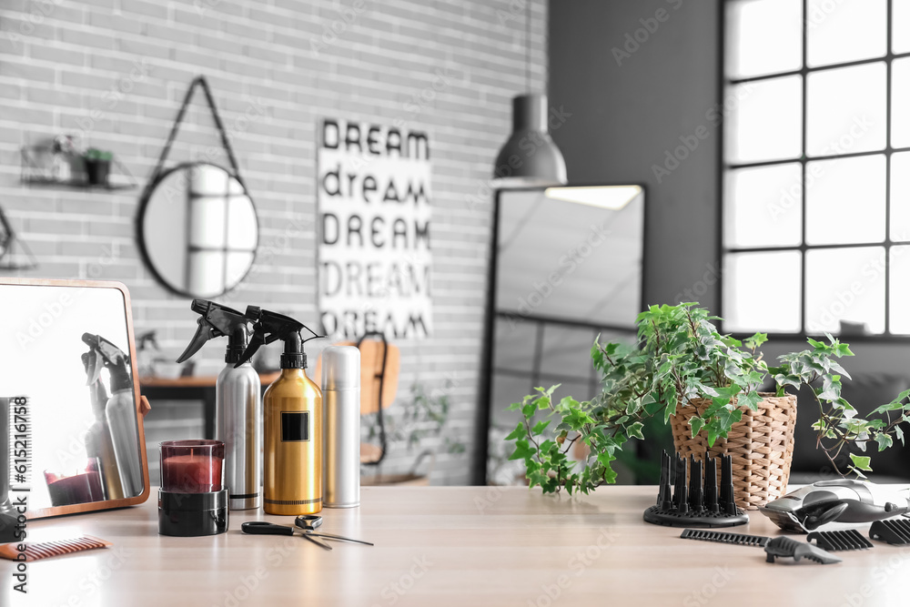 Hairdressing tools on table in beauty salon