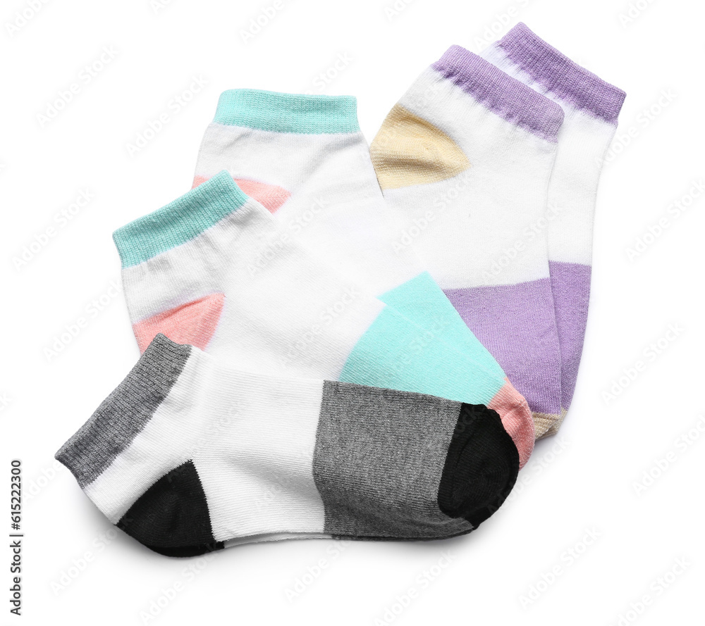 Set of different cotton socks on white background