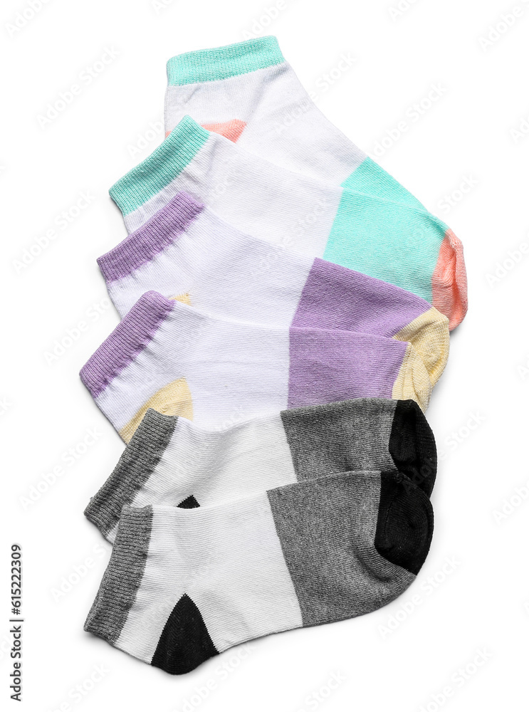 Set of different cotton socks on white background