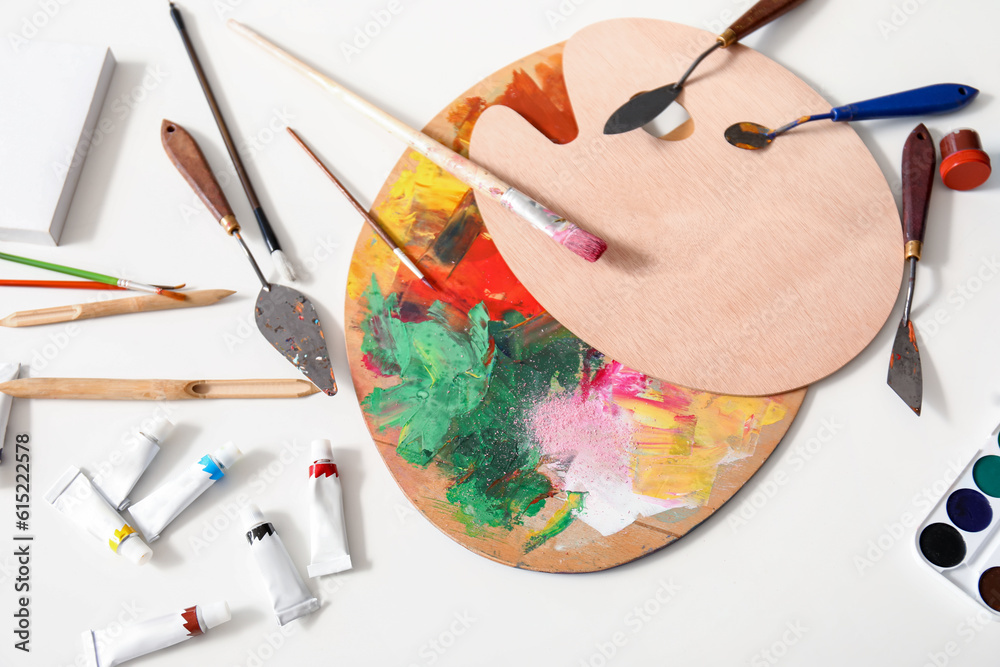 Different artists supplies on table, top view