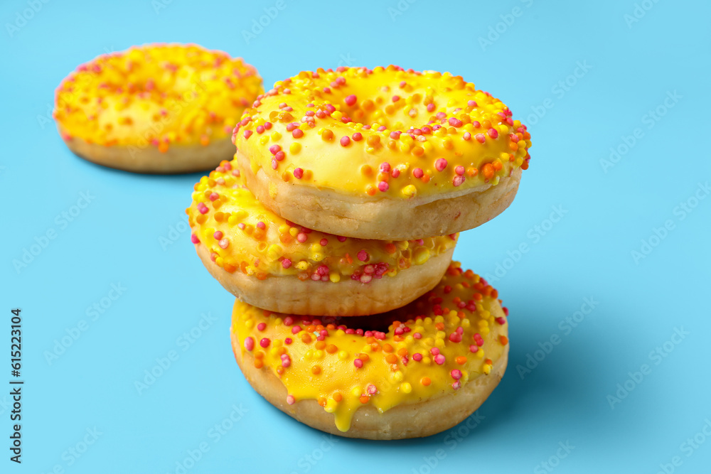 Sweet donuts on blue background