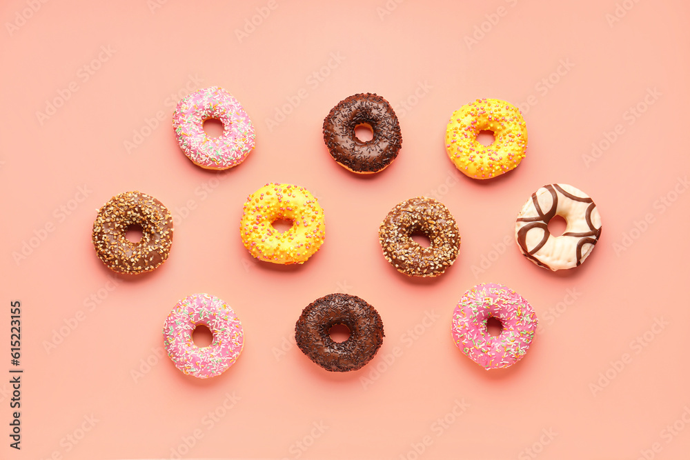 Sweet donuts on pink background