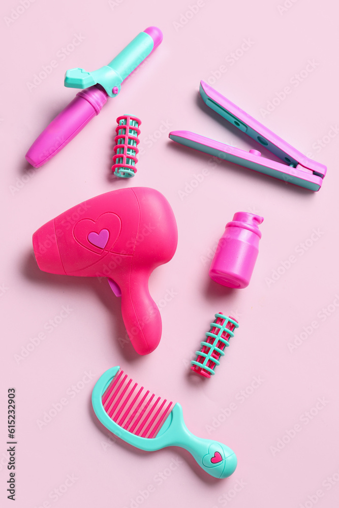 Set of hairdressing accessories on pink background. Childrens Day celebration