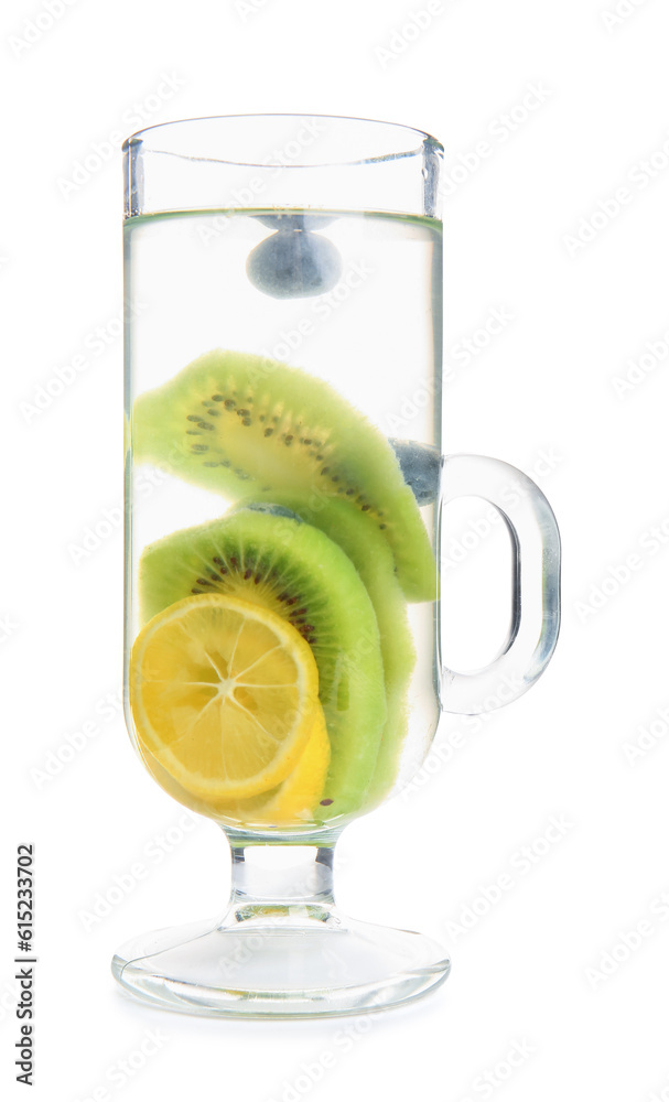 Glass of infused water with different sliced fruits on white background