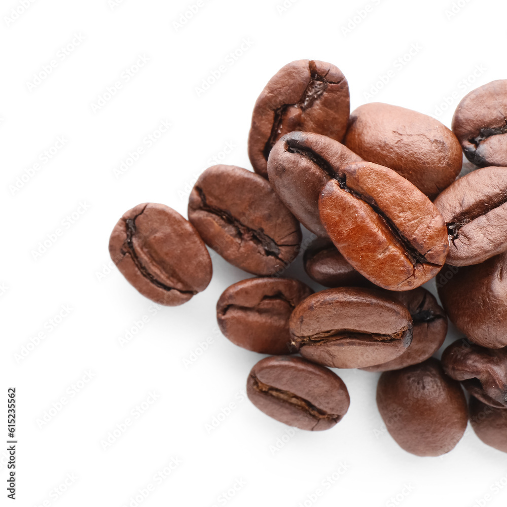 Heap of coffee beans on white background