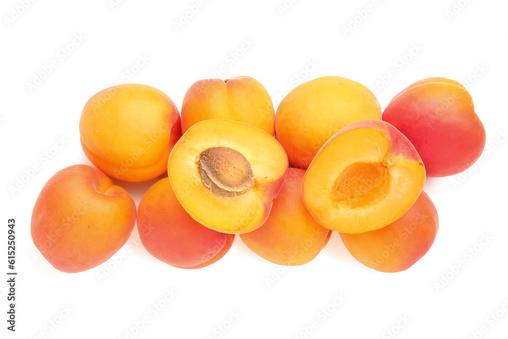 Heap of ripe apricots isolated on white background