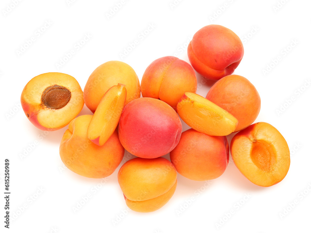 Heap of ripe apricots isolated on white background