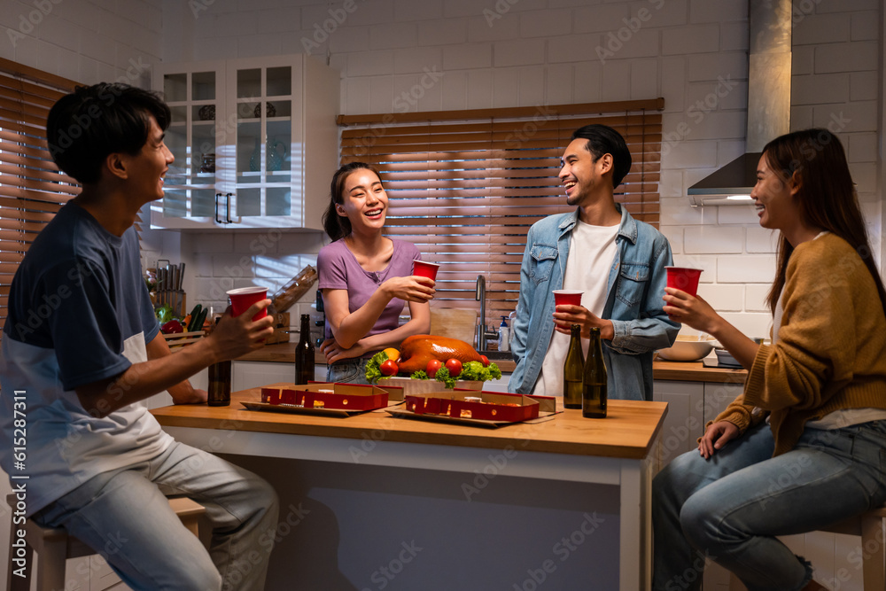 Group of Asian friend having dinner, enjoy evening party together at home. 