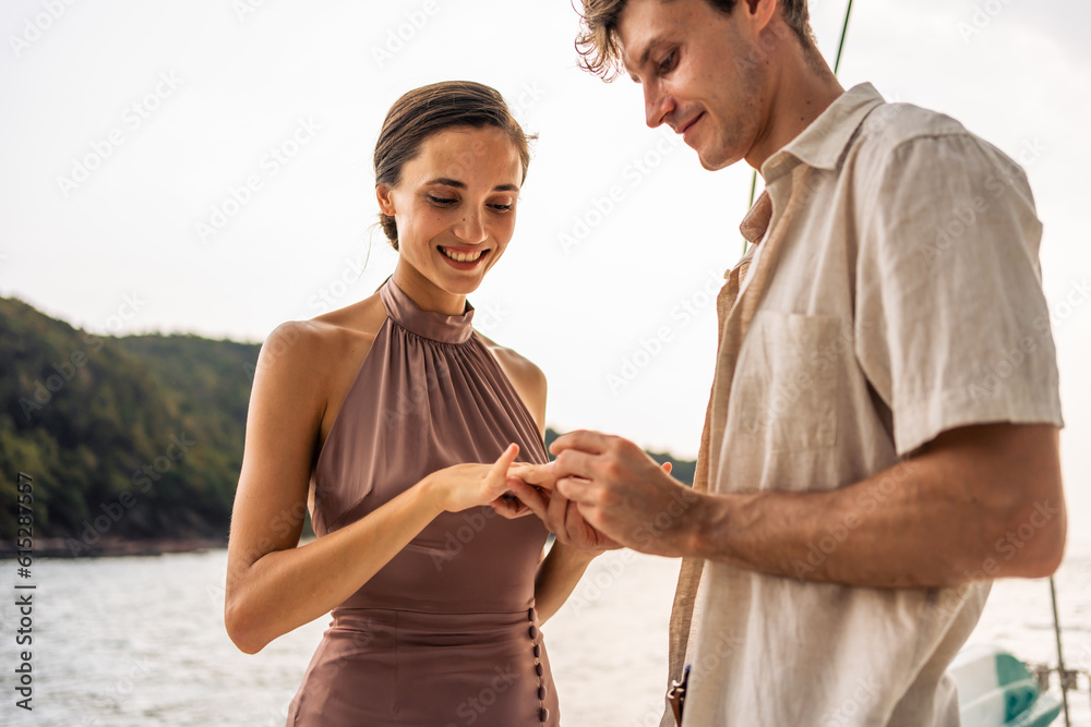 Caucasian young man make surprise proposal of marriage to girlfriend. 