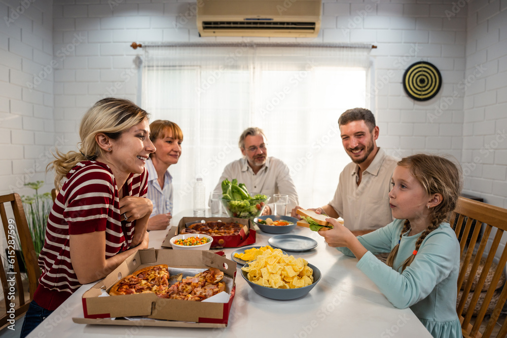 Caucasian lovely family having dinner, enjoying evening party in house. 