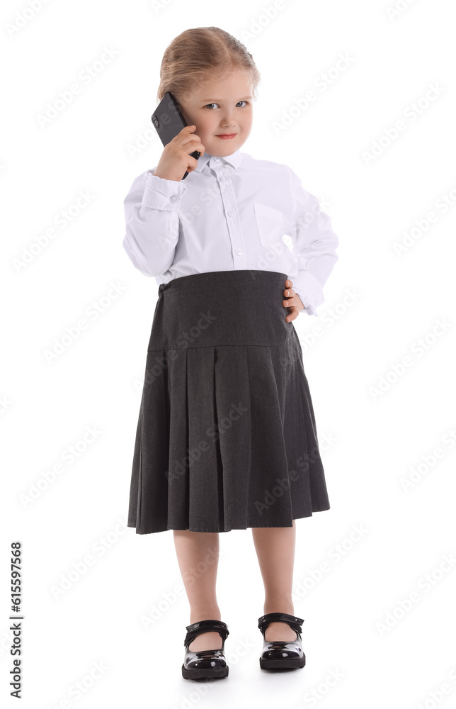 Funny little businesswoman talking by mobile phone on white background