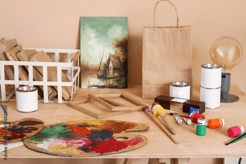 Table with artists supplies in studio