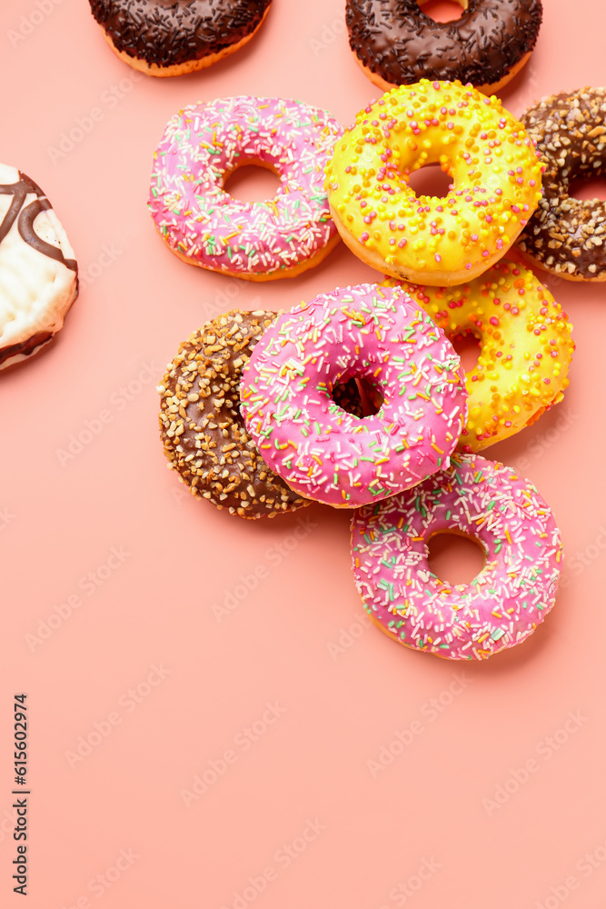 Sweet donuts on pink background