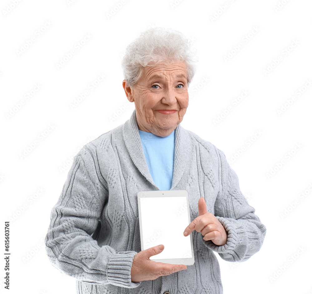 Senior woman with tablet computer on white background