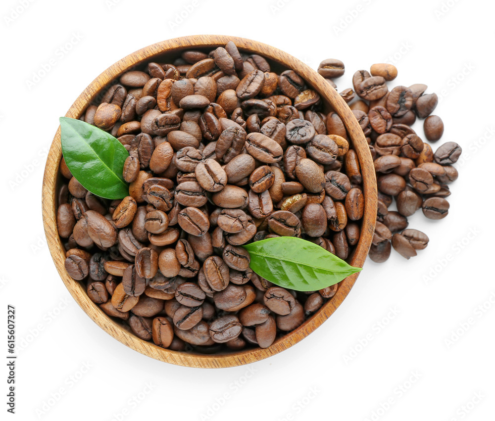 Bowl with coffee beans on white background