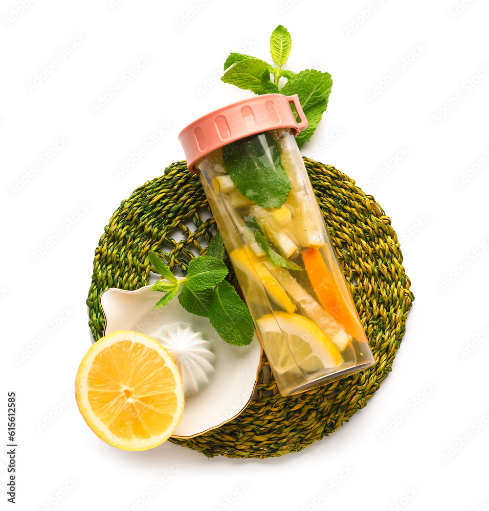 Sports bottle of infused water with lemon and mint on white background