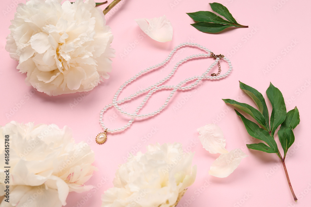 Composition with beautiful female necklace and white peony flowers on pink background