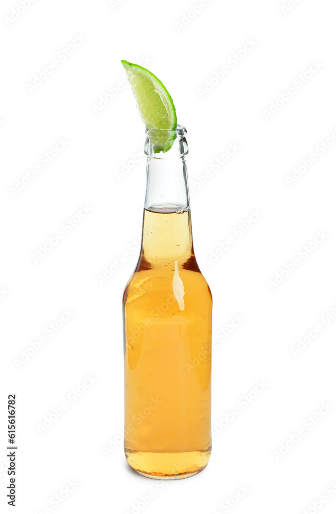 Bottle of cold beer with lime on white background