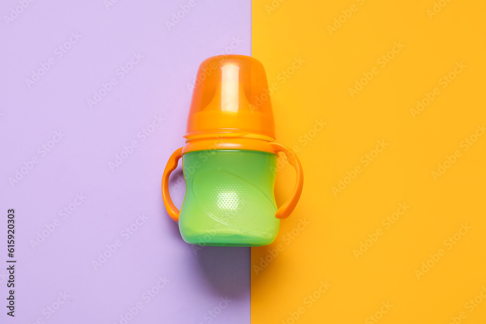 Bottle with milk for baby on color background