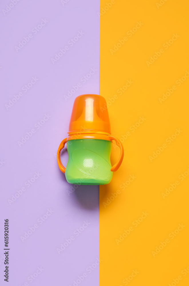 Bottle with milk for baby on color background