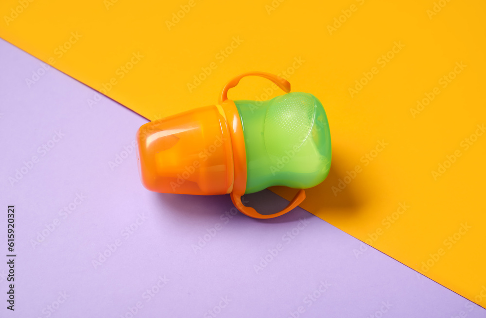 Bottle with milk for baby on color background