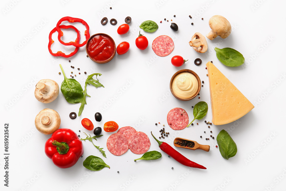 Frame made of fresh ingredients for preparing pizza on white background