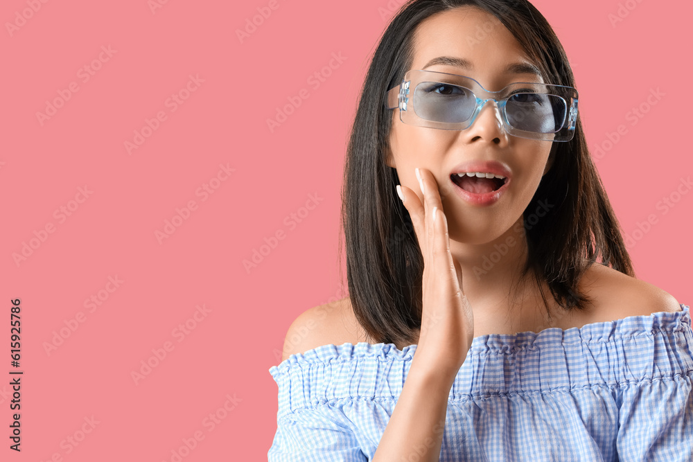 Beautiful Asian woman in stylish sunglasses on pink background, closeup