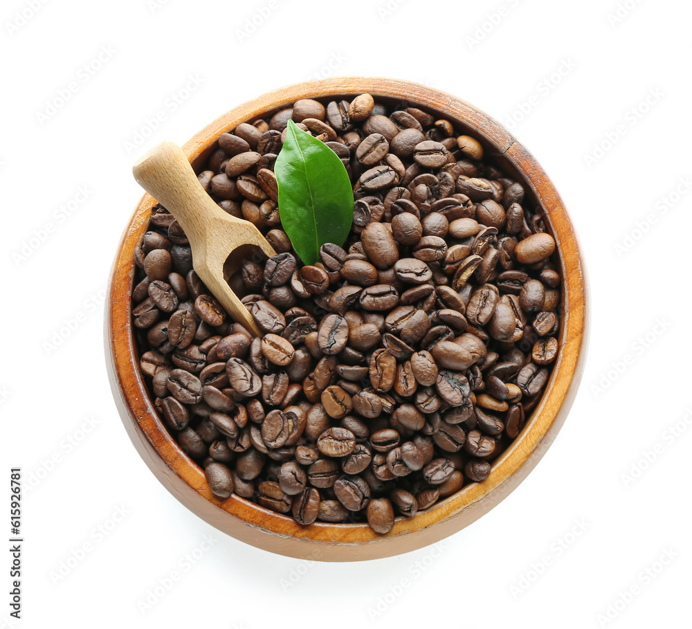 Bowl with coffee beans on white background