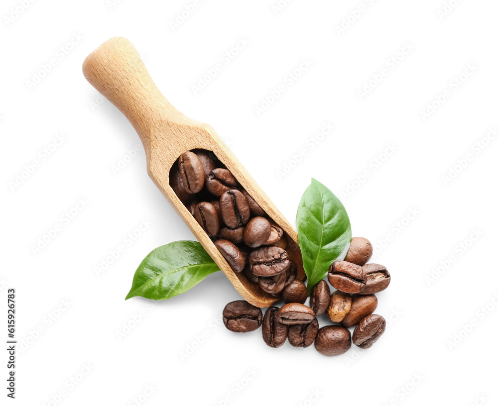 Scoop with coffee beans on white background