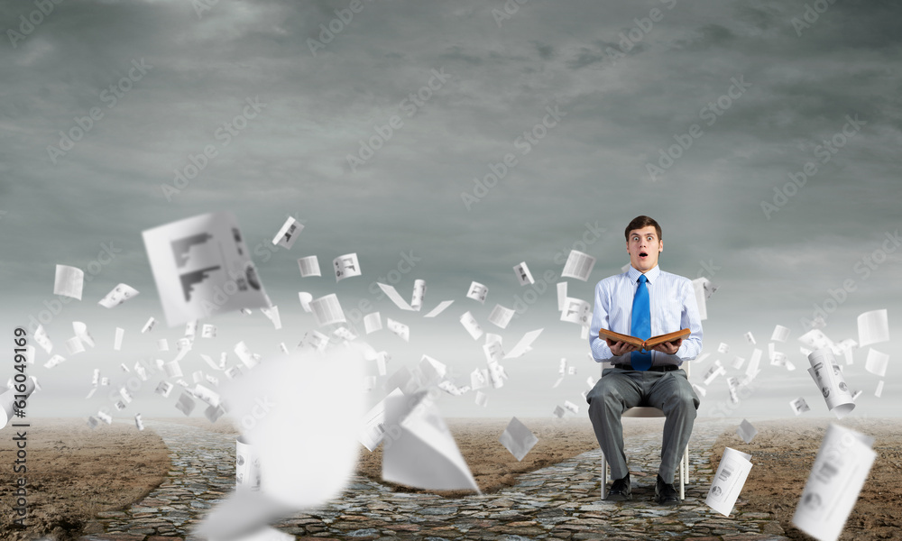 young businessman with book