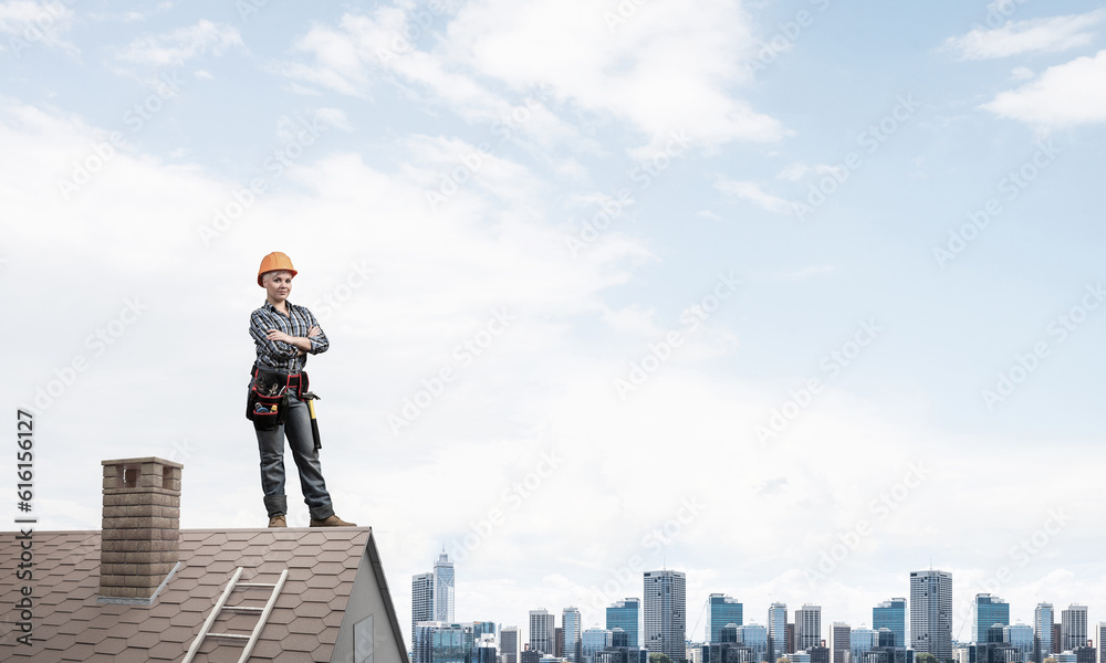 Attractive female worker in hardhat