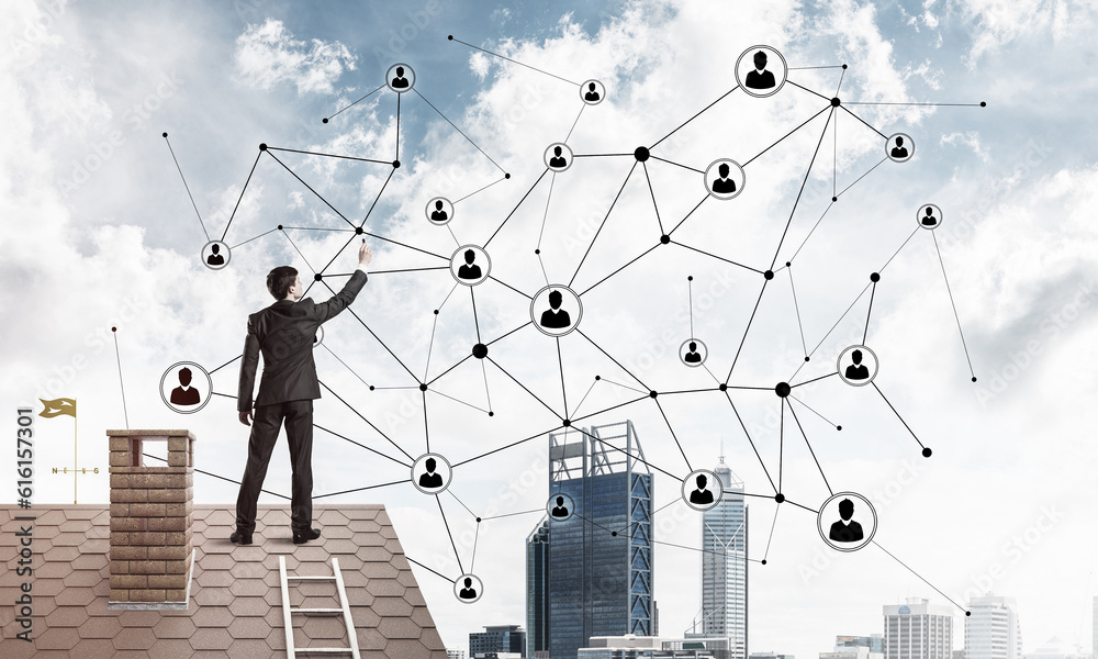 Businessman on house roof presenting networking and connection c