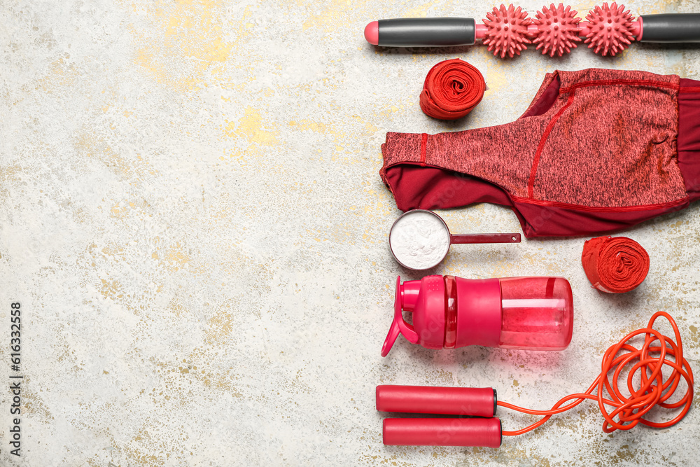 Composition with sports equipment, clothes and amino acid supplement on light background