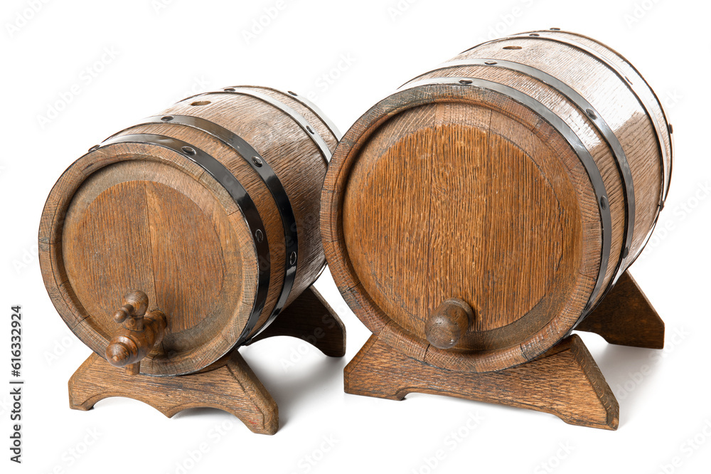 Oak barrels with metal hoops isolated on white background