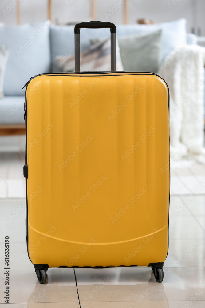 Yellow suitcase in living room