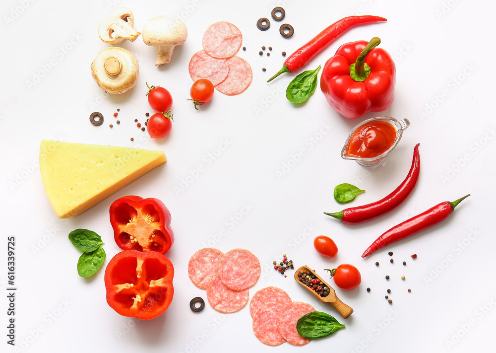 Frame made of fresh ingredients for preparing pizza on white background