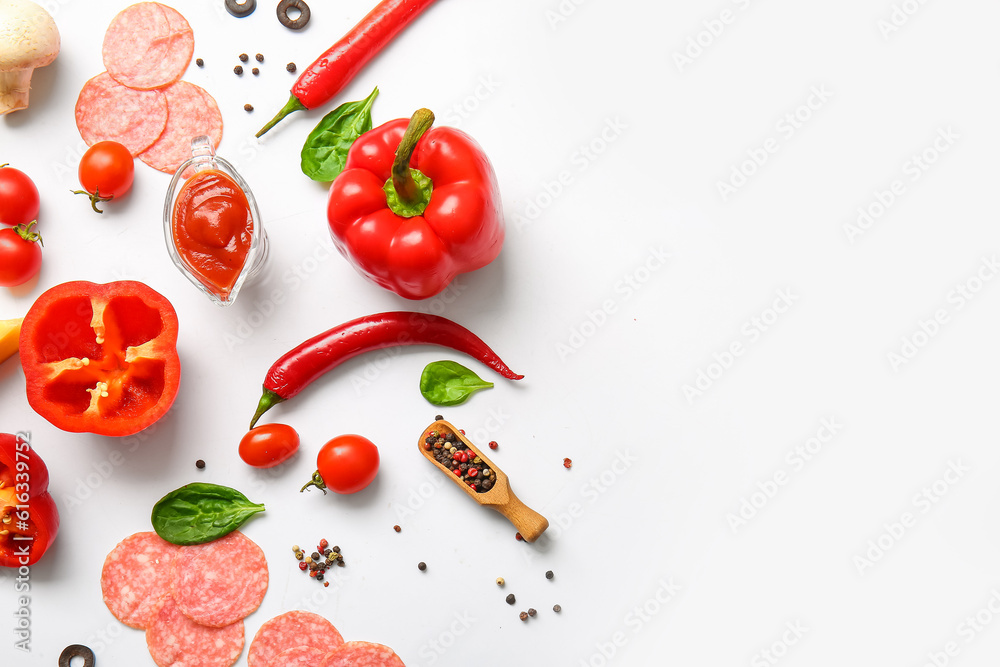 Fresh ingredients for preparing pizza on white background