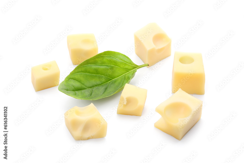 Cubes of tasty Swiss cheese isolated on white background