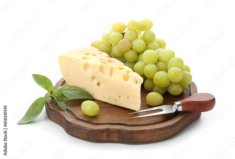 Wooden board with tasty Swiss cheese and grapes on white background