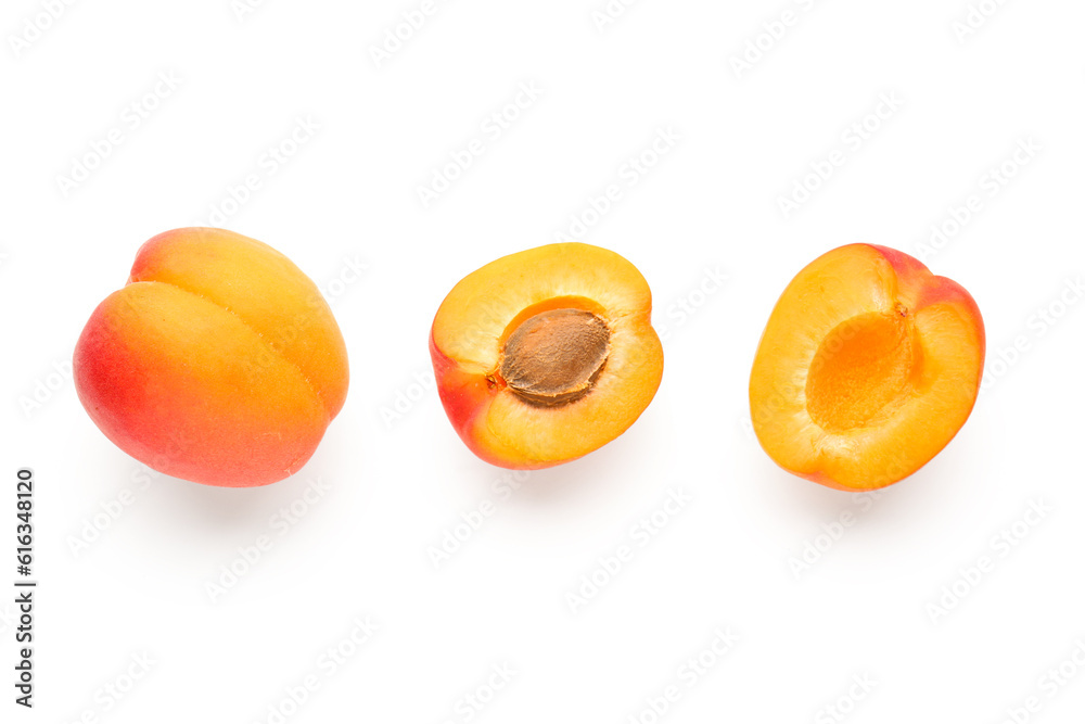 Ripe apricots isolated on white background