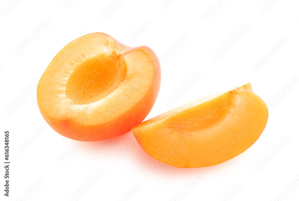 Ripe cut apricot isolated on white background